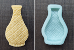 An unbaked cookie in the shape of a vase with  a diamond shaped pattern next to the Artesao Silicone Cookie Mold used to create it